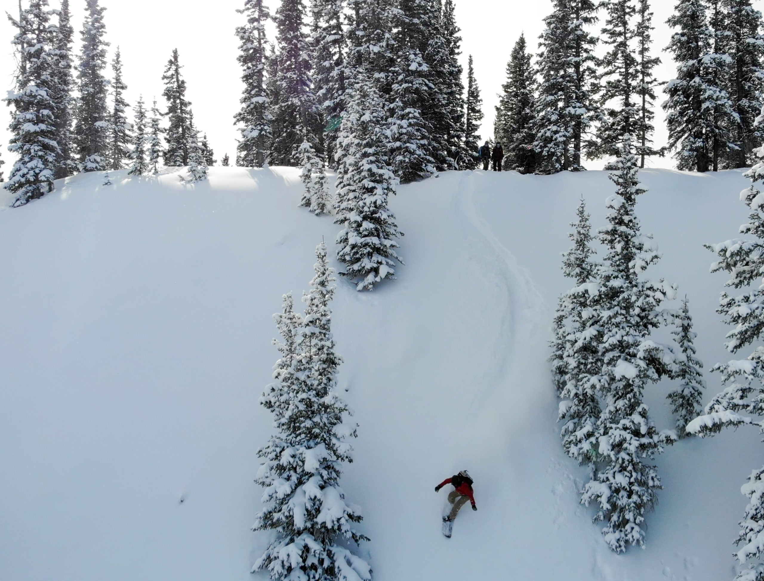 snowboarding down mountain